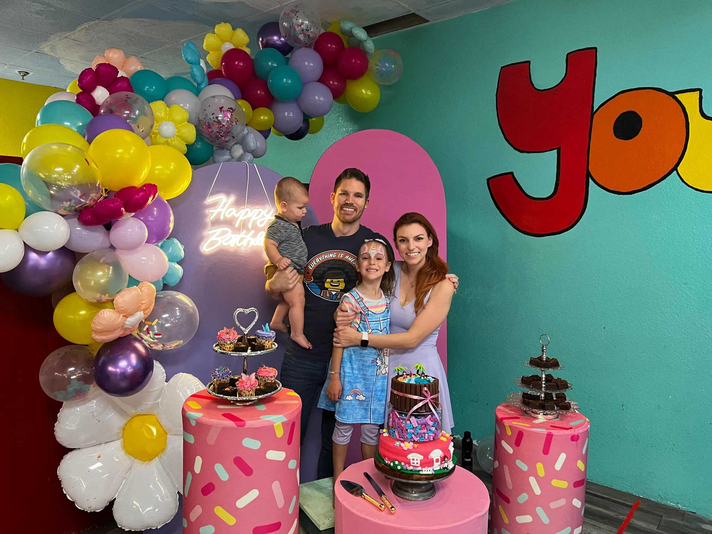 A themed birthday cake on the party table