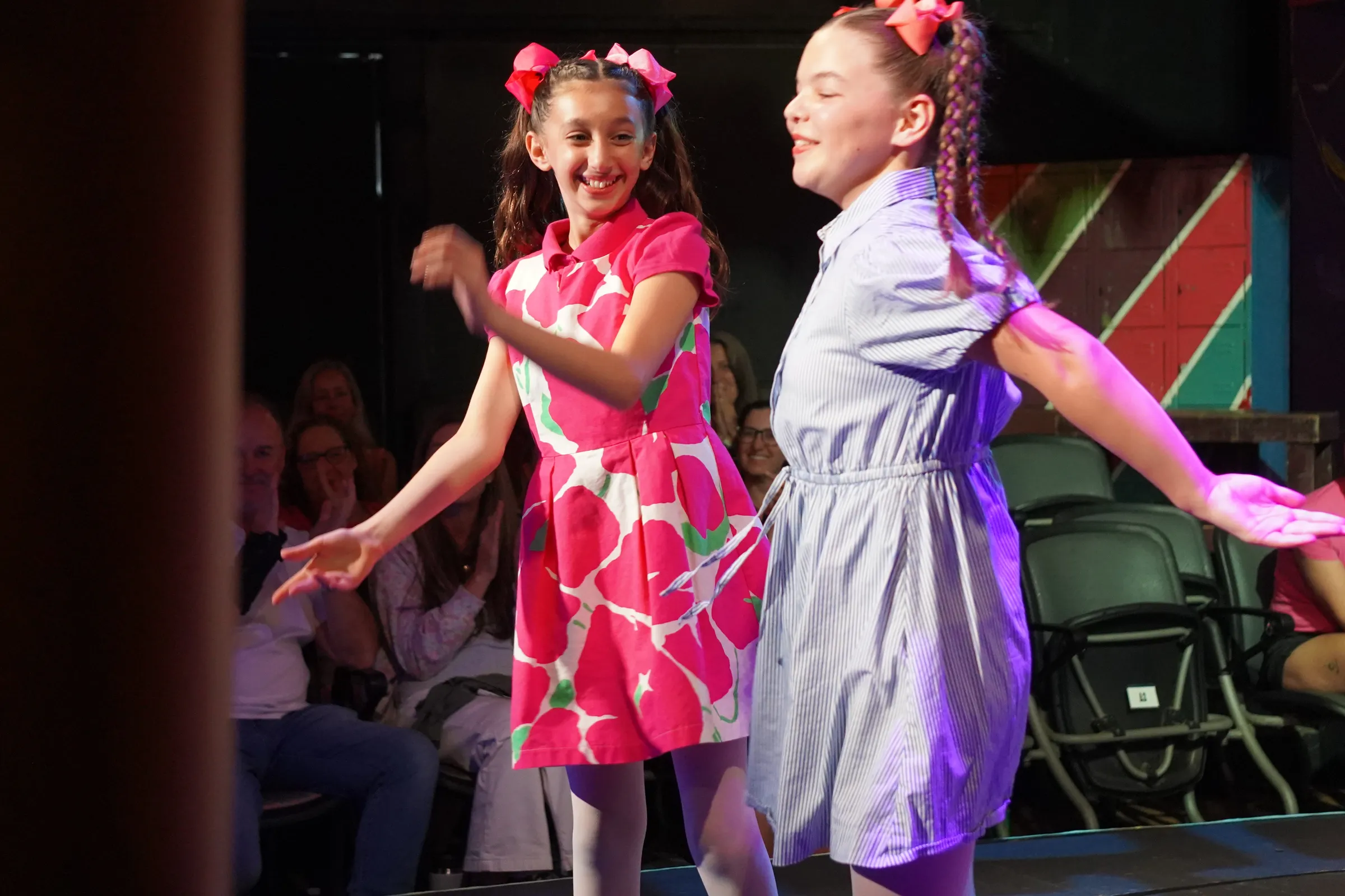 Children dancing at a party in the studio